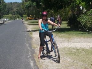 Kenna on her bike in Byron Bay