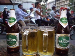 Chilling at a bar drinking $1 Saigon beer, watching the crazy motorcycle traffic of Saigon in front of us.